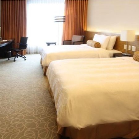 Hotel The Bellevue Manila à Muntinlupa City Extérieur photo